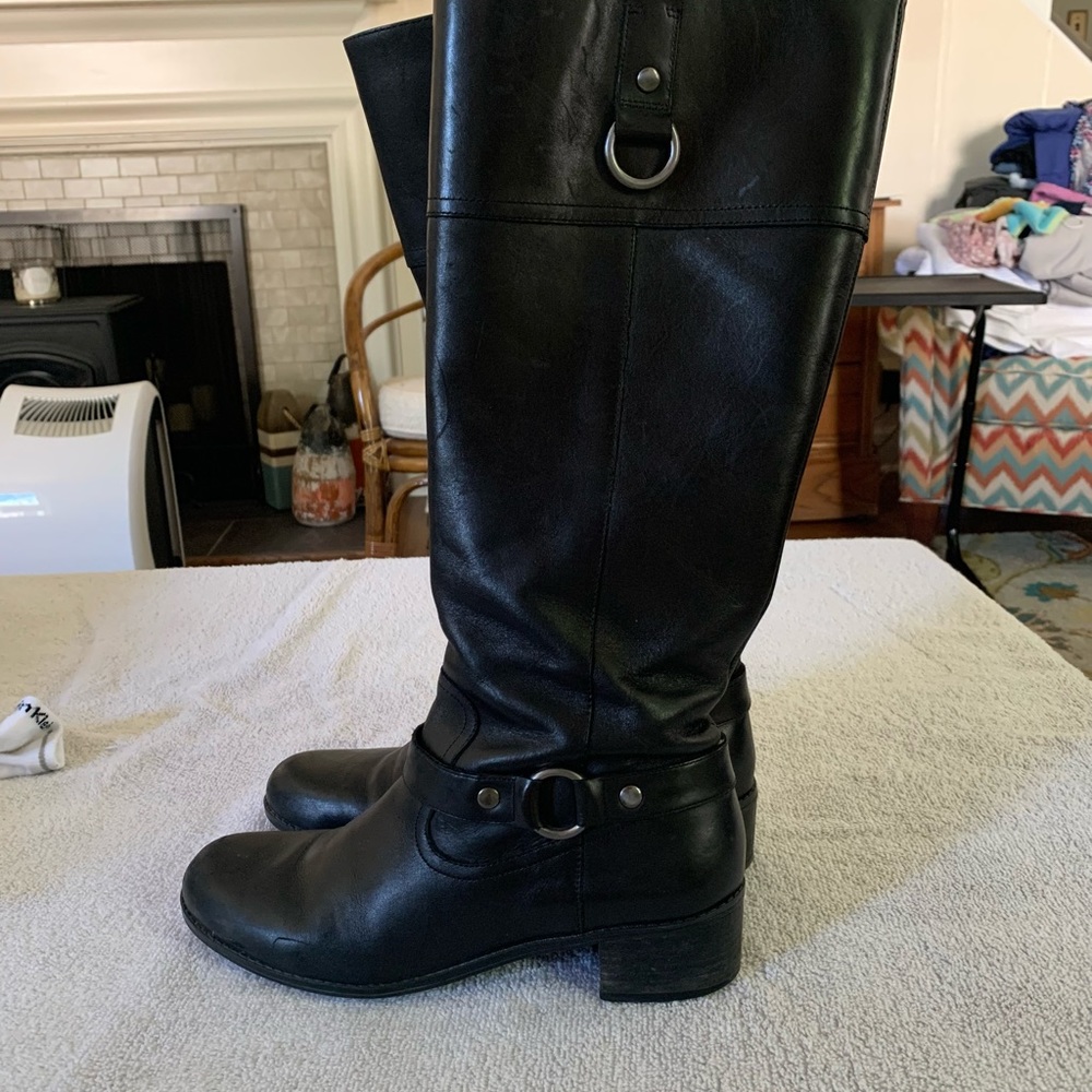 Black leather knee high motor boots